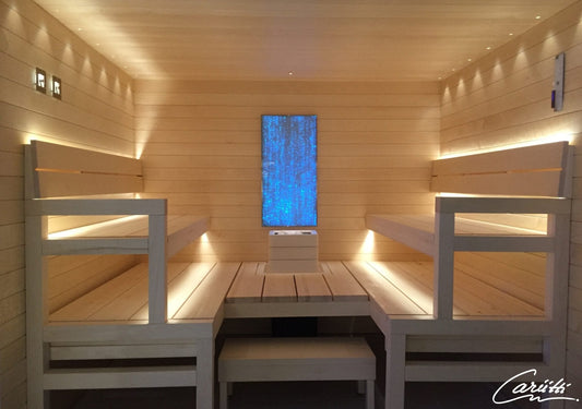 Cariitti Linear LED 2m em sauna com bancos de madeira.