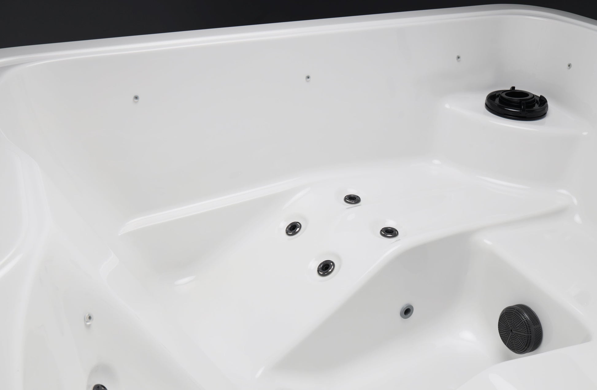 Jacuzzi Exterior Vellamo S em close-up mostrando detalhes da banheira.